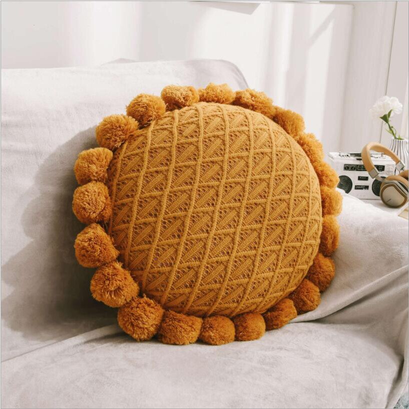 Pompom Adorned Round Pillow